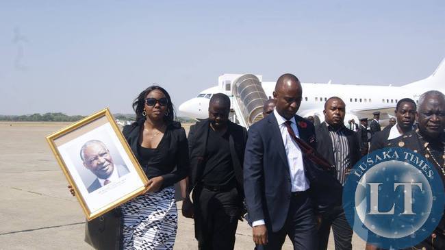 President Sata's family walk away from the plane