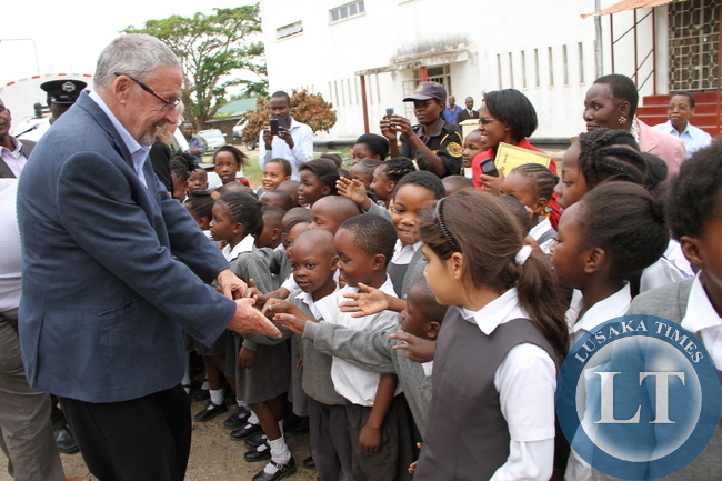 Acting President Dr Guy Scott greets Kabwe Trustee school shortly before departure for Lusaka