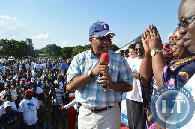 Dr Mumba introduces his wife Florence and NEC members