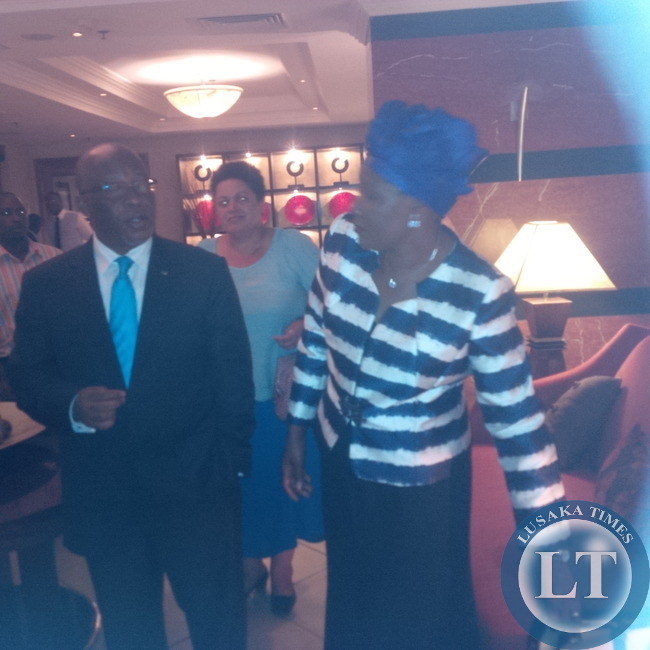Dr Nevers Mumba consulting with Ms Nawakwi before leaving the hotel