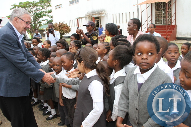 Acting President Dr Guy Scott greets Kabwe Trustee school shortly before departure for Lusaka