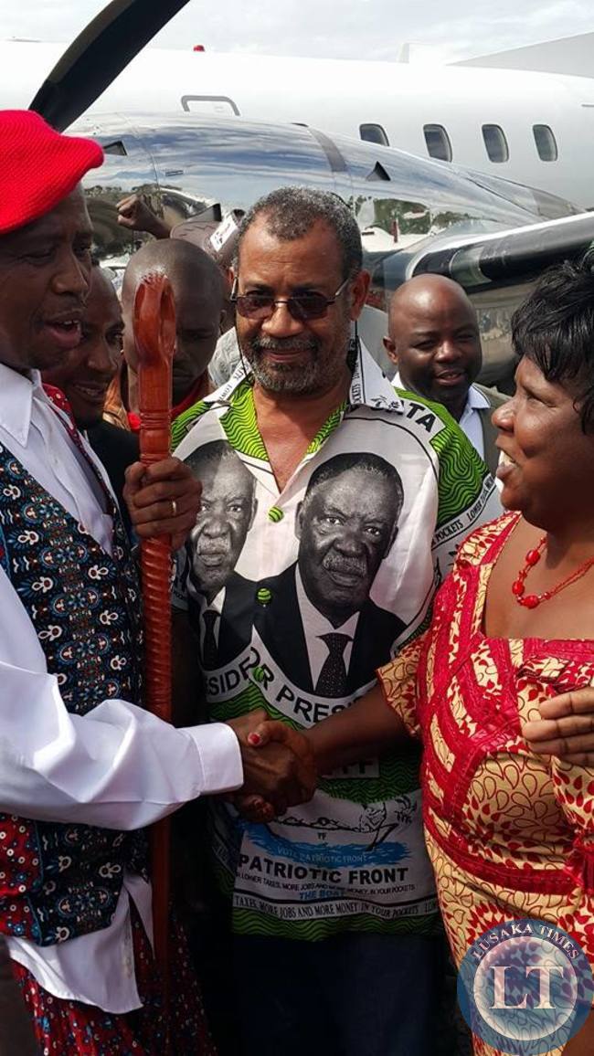 Edgar Lungu greeting supporters at the airport in Mongu