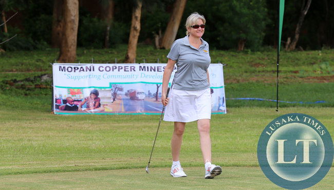 Dr Charotte Scott at State House playing Golf