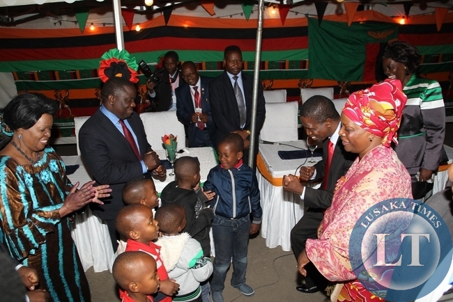 President Edgar Lungu and First Lady Esther interacts with children of the zambian community living in Addis Ababa, Ethiopia on the sidelines of the 24th ordinary session of the African Union summit. On the left is Zambia's Ambassador to Ethiopia Susan Sikaneta and Foreign Affairs Minister Harry Kalaba.