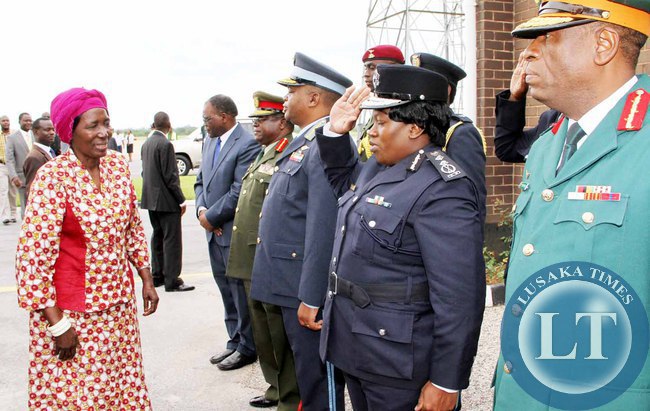 Acting President Inonge Wina greets service Chiefs shortly before seeing- off President Lungu at Kenneth Kaunda International Airport who left for Addis Ababa, Ethiopia for the African Union Summit on January 29,2015 -Picture by THOMAS NSAMA