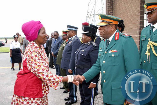 Acting President Inonge Wina greets service Chiefs shortly before seeing- off President Lungu at Kenneth Kaunda International Airport who left for Addis Ababa, Ethiopia for the African Union Summit on January 29,2015 -Picture by THOMAS NSAMA