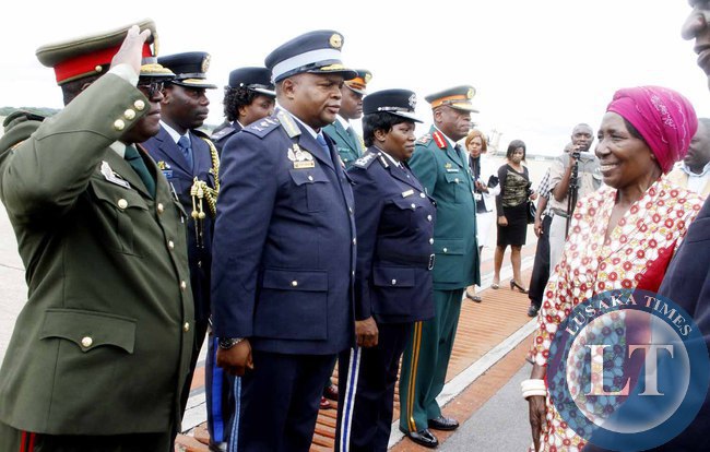 Acting President Inonge Wina greets service Chiefs after seeing- off President Lungu at Kenneth Kaunda International Airport who left for Addis Ababa, Ethiopia for the African Union Summit on January 29,2015 -Picture by THOMAS NSAMA