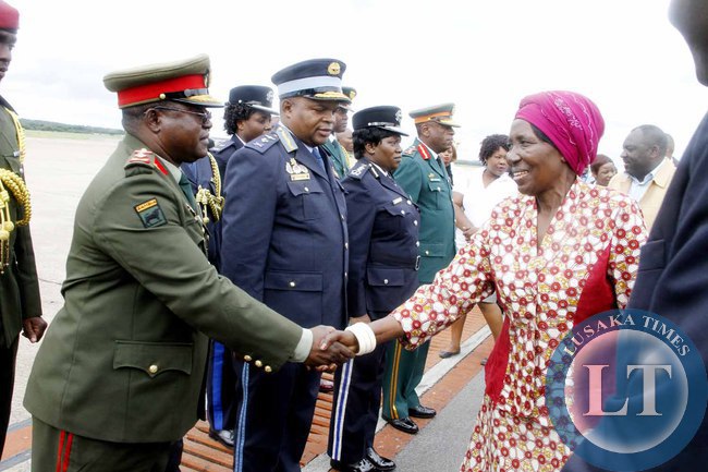 Acting President Inonge Wina greets service Chiefs after seeing- off President Lungu at Kenneth Kaunda International Airport who left for Addis Ababa, Ethiopia for the African Union Summit on January 29,2015 -Picture by THOMAS NSAMA
