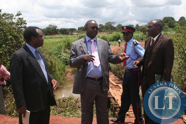 Newly appointed North Western province minister Dawson Kafwaya inspects the bridge 1