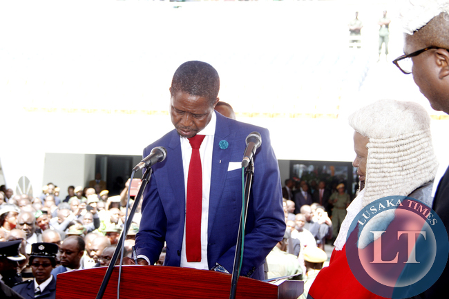 President Edgar Lungu with Acting Chief Justice Lombe Chibesakunda during his Inauguration Ceremony at Heroes Stadium on January 25,2015 -Picture by THOMAS NSAMA