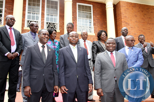 President Edgar Chagwa Lungu with Vice-President Inonge Wina, North Western Province minister, Justice minister Ngosa Simbyakula, Finance minister Alexander Chikwanda, Home affairs Davies Mwila, Tourism minister Jean Kapata , Health minister Dr Joseph Kasonde, State House Special Assistant to the President for Political affairs Kaiza Zulu, Special Assistand for Press and Public Relations Amos Chanda after the Swearing-in-Ceremony at State House on January 26,2015 -Picture by THOMAS NSAMA