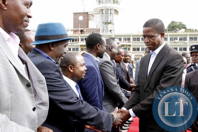 President Edgar Lungu greets Rabson Soko on arrival at Kenneth Kaunda International Airport shortly before departure to Addis Ababa, Ethiopia for the African Union Summit on January 29,2015 -Picture by THOMAS NSAMA