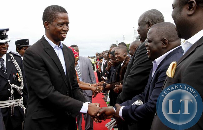 President Edgar Lungu greets PF officials on arrival at Kenneth Kaunda International Airport shortly before departure to Addis Ababa, Ethiopia for the African Union Summit on January 29,2015 -Picture by THOMAS NSAMA