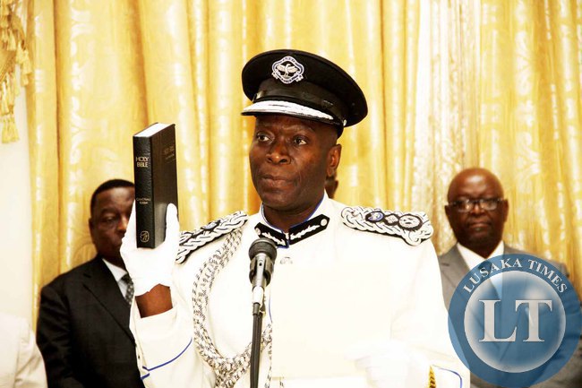 Inspector General of Police Kakoma Kanganja taking Oath during the swearing -in-Ceremony