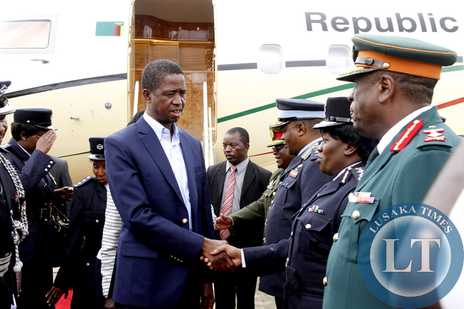 President Edgar Lungu greeting the Inspector General of Police Stella Libongani on arrival at Kenneth Kaunda International Airport from Addis Ababa, Ethiopia where he attended the African Union Summit on February 1,2015 -Picture by THOMAS NSAMA