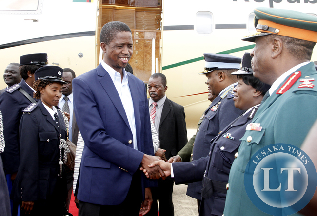 President Edgar Lungu greeting the Inspector General of Police Stella Libongani on arrival at Kenneth Kaunda International Airport from Addis Ababa, Ethiopia where he attended the African Union Summit on February 1,2015 -Picture by THOMAS NSAMA