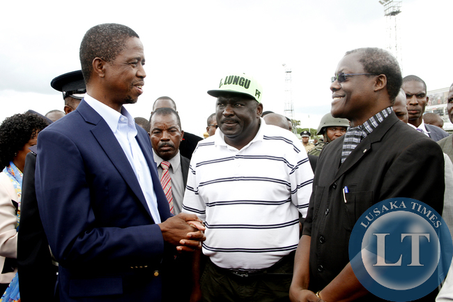 President Lungu-Ngosa Simbyakula 044 President Edgar Lungu with PF Secretary General Davies Chama and Justice Ngosa Simbyakula on arrival at Kenneth Kaunda International Airport on February 1,2015 -Picture by THOMAS NSAMA