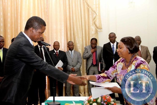 President Edgar Lungu (l) congratulates Kenya's High commissioner to Zambia Sophy Kadso Kombe during the presentation of credentials at Sate House on February 18,2015 -Picture by THOMAS NSAMA