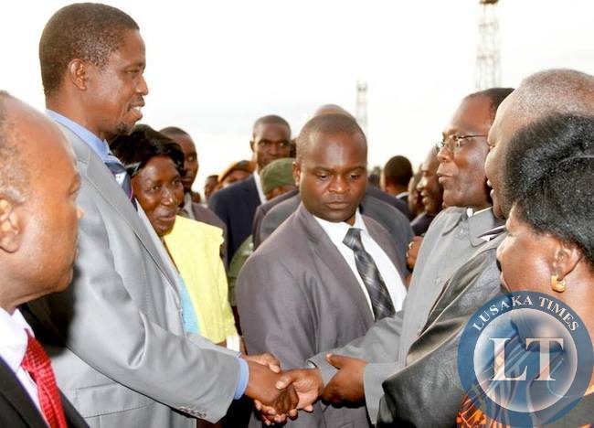 President Edgar Lungu being welcomed by Secretary to the Cabinet Dr Roland Msiska on arrival fro Angola at Kenneth Kaunda International Airport Picture by THOMAS NSAMA President Edgar Lungu being welcomed by Secretary to the Cabinet Dr Roland Msiska on arrival fro Angola at Kenneth Kaunda International Airport Picture by THOMAS NSAMA