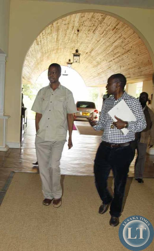 President Edgar Chagwa Lungu with his special Assistant for Press and Public Relations Amos Chanda in Mfuwe on Thursday,February 5,2015.PICTURE BY SALIM HENRY/STATE HOUSE President Edgar Chagwa Lungu with his special Assistant for Press and Public Relations Amos Chanda in Mfuwe on Thursday,February 5,2015.PICTURE BY SALIM HENRY/STATE HOUSE