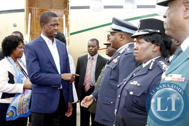 President Edgar Chagwa Lungu accompanied by First Lady Esther Lungu talks to ZAF Commander Lt Gen Eric Chimese on arrival at Kenneth Kaunda International Airport from Addis Ababa, Ethiopia where he attended the African Union summit on February 1,2015 -Picture by THOMAS NSAMA