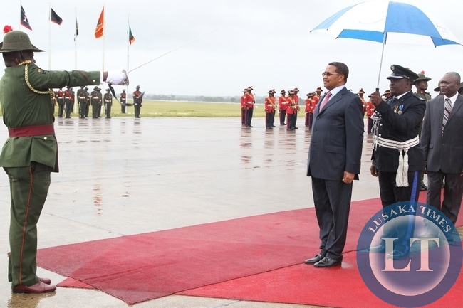 President of Tanzania,Jakaya Kikwete after inspecting the guard of honour upon arrival for a state visit at Kenneth Kaunda International Airport in Lusaka.