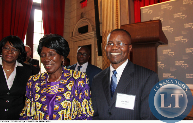 New York-based Zambian social commentator James Mwape (right) shares a light moment with Vice-President Inonge Wina as they poses for a photo at Columbia University on 11 March, 2015. PHOTO | CHIBAULA D. SILWAMBA | ZAMBIA UN MISSION