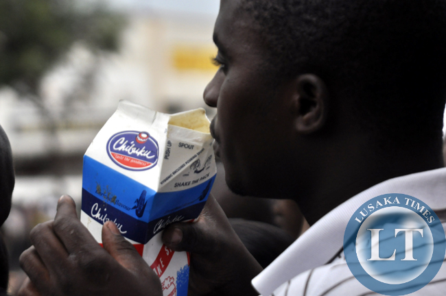 An unidentified man sips opaque Skake-shake beer