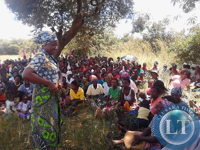 Nawakwi with checking farmers crops