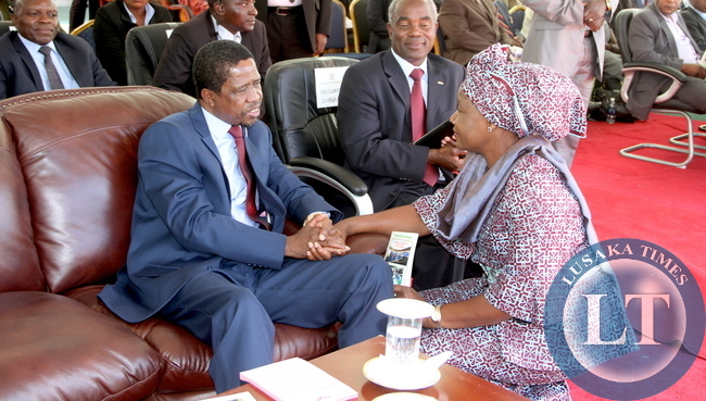 President Edgar Lungu talks to FDD president Edith Nawakwi during the Celebration of the one million membership of the Seventh Day Adventist Church in Zambia at Heroes Stadium on April 25,2015 -Picture by THOMAS NSAMA