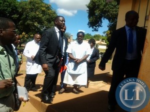 Parliamentary committee on health chairperson Likando Mufalali leads the way to the mothers shelter at Chipata General Hospital
