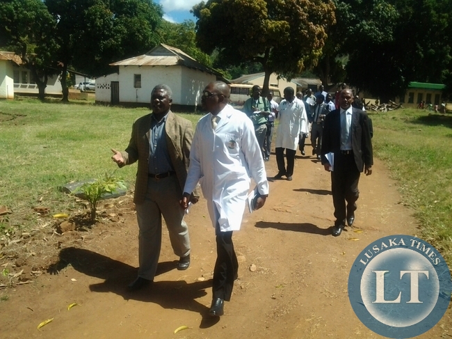 Mumbwa MP Dr Brian Chituwo with chipata General Hospital acting medical superintendent Dr Mbinga Mbinga during the tour of the parliamentary committee on health at the institution