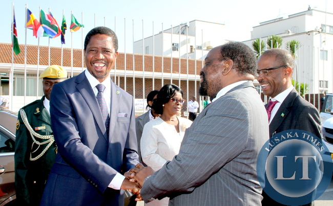 President Edgar Chagwa Lungu with Zimbabwe's Foreign affairs minister Simbarashe Mumbengegwi at Harare International Airport shortly before departure for Bulawayo where he will officially open the Zimbabwe Trade Fair on April 30,2015 -Picture by THOMAS NSAMA