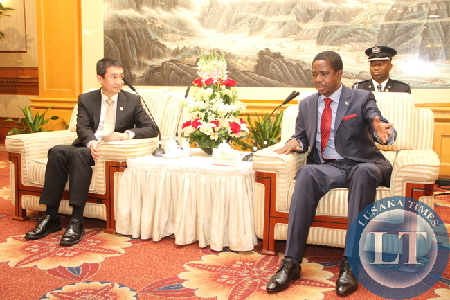 President Lungu during a meeting with Huawei Senior Vice-President Dafeng Li at Shenzhen Wuzhou Guest House in China on April 1,2015 -Picture by THOMAS NSAMA