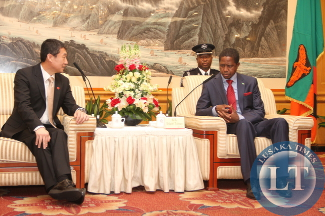 President Lungu during a meeting with Huawei Senior Vice-President Dafeng Li at Shenzhen Wuzhou Guest House in China on April 1,2015 -Picture by THOMAS NSAMA