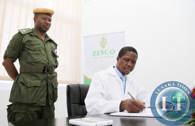 President Lungu Signs a Visitors Book at ZESCO Lunzua Power Plant