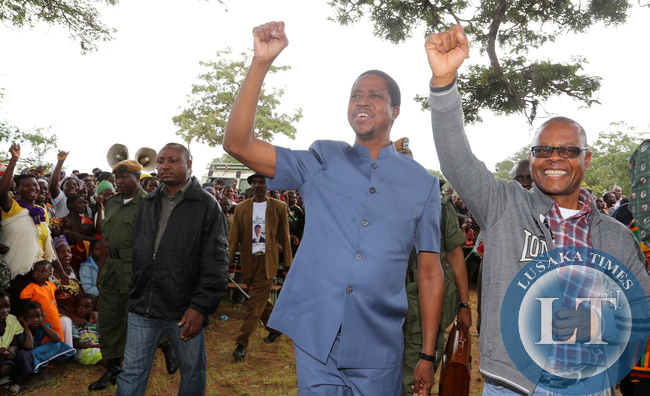 President Edgar Lungu with Pf Candidate Kapembwa Simbao greets Supporters at Tanzuka school in Senga Constituency- Picture by Eddie Mwanaleza/ state house 10-04-2015.