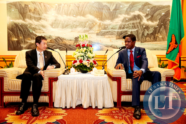 President Lungu during a meeting with Huawei Senior Vice-President Dafeng Li at Shenzhen Wuzhou Guest House in China on April 1,2015 -Picture by THOMAS NSAMA