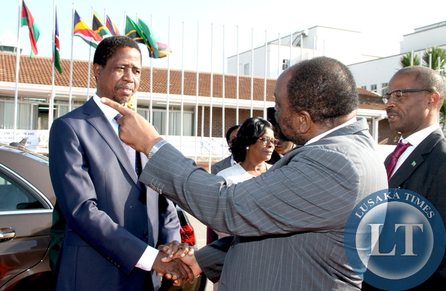 President Edgar Chagwa Lungu with Zimbabwe's Foreign affairs minister Simbarashe Mumbengegwi at Harare International Airport shortly before departure for Bulawayo where he will officially open the Zimbabwe Trade Fair on April 30,2015 -Picture by THOMAS NSAMA
