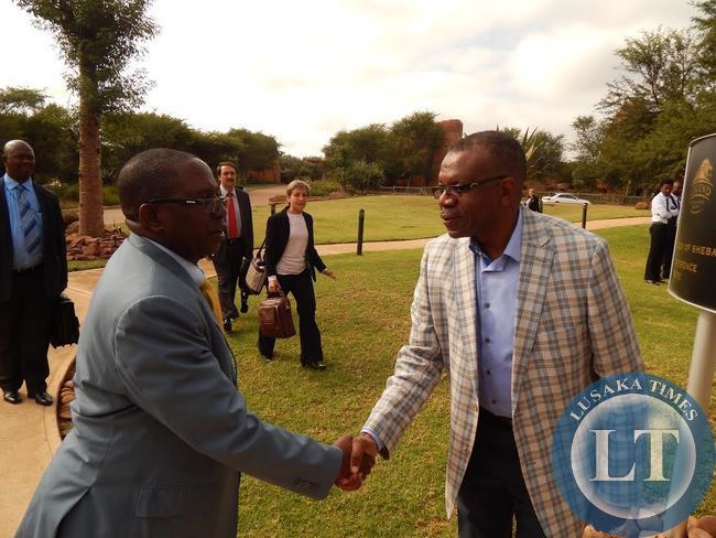 ZAMBIA'S High Commissioner to South Africa, His Excellency Mr. Muyeba Chikonde (r) welcomes Foreign Affairs Deputy Minister, Mr. Rayford Mbulu when he arrived at the venue for the 14th Africa - Nordic Meeting at Legends Golf Safari Resort in Limpopo, South Africa, on Friday, 10th April, 2015.