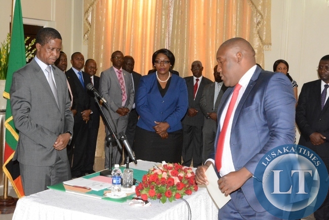 Sukwana Lukaangaba presenting his credentials to President Edgar Lungu during the swearing in ceremony at State House