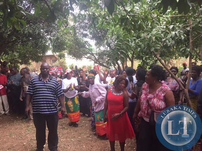 UPND President Hakainde Hichilema interacts with residents in Linda compound