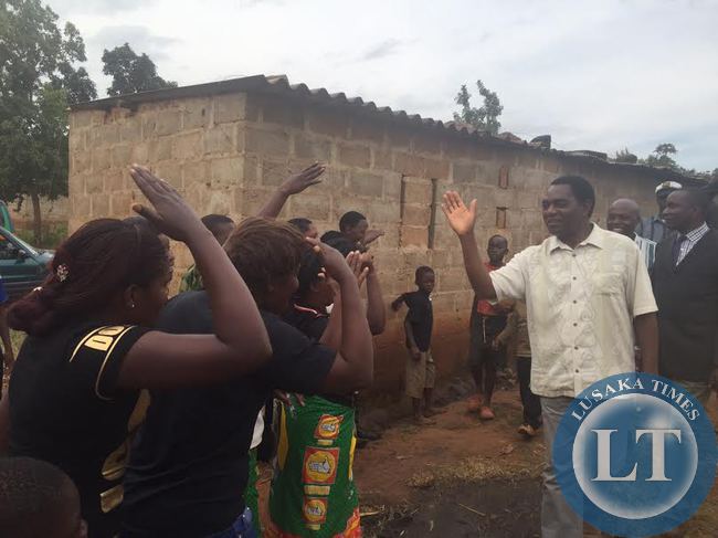 UPND President Hakainde Hichilema interacts with residents in Linda compound
