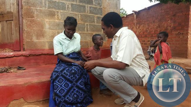 UPND President Hakainde Hichilema interacts with residents in Linda compound