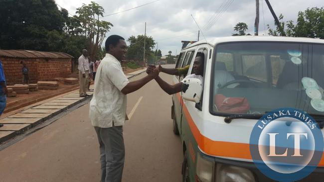 UPND President Hakainde Hichilema interacts with residents in Linda compound