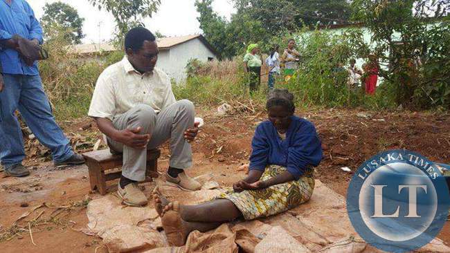 UPND President Hakainde Hichilema interacts with residents in Linda compound
