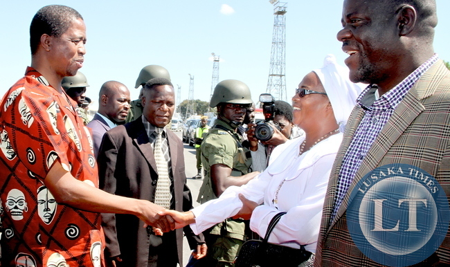 President Edgar Chagwa Lungu being PF Deputy National Secretary Mumbi Phiri on arrival at Kennneth Kaunda International Airport from Livingstone on May 10,2015 -Picture by THOMAS NSAMA