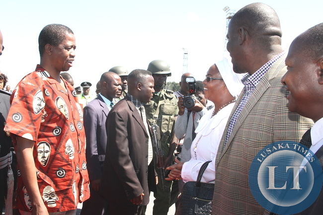 President Edgar Chagwa Lungu being PF Deputy National Secretary Mumbi Phiri on arrival at Kennneth Kaunda International Airport from Livingstone on May 10,2015 -Picture by THOMAS NSAMA