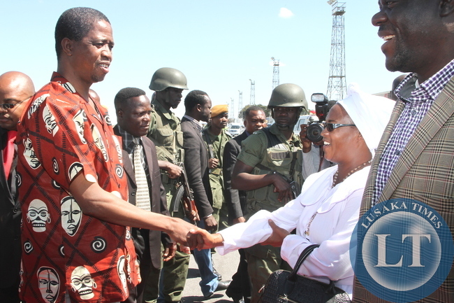 President Edgar Chagwa Lungu being PF Deputy National Secretary Mumbi Phiri on arrival at Kennneth Kaunda International Airport from Livingstone on May 10,2015 -Picture by THOMAS NSAMA