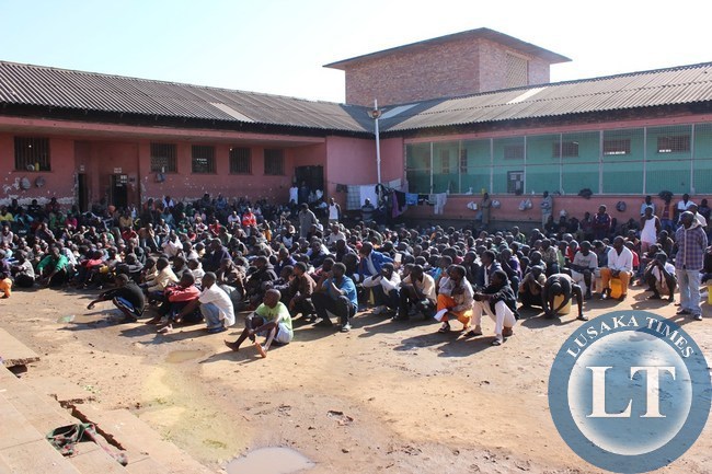 Prisoners listening to Home Affairs Deputy Minister Panji Kaunda (not in picture) at Livingstone Central Prison on Monday. Prisoners listening to Home Affairs Deputy Minister Panji Kaunda (not in picture) at Livingstone Central Prison on Monday.
